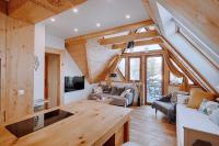 Posedenie v ubytovaní Apartament Tatry Folk regionalny Grota Solna