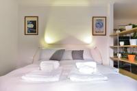 A bed or beds in a room at Appartamento Piazza Navona
