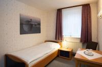Postel nebo postele na pokoji v ubytování Gruppenhaus St Andreasberg Braunlage Harz