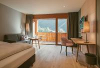 Ein Sitzbereich in der Unterkunft TRAUBE BRAZ Alpen Spa Golf Hotel