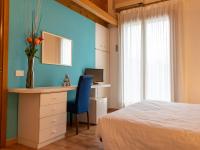 Posteľ alebo postele v izbe v ubytovaní Hotel New Genziana