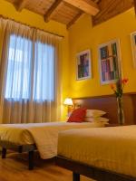 Posteľ alebo postele v izbe v ubytovaní Hotel New Genziana