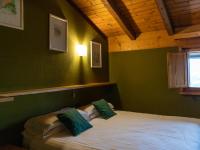 Posteľ alebo postele v izbe v ubytovaní Hotel New Genziana