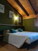 Posteľ alebo postele v izbe v ubytovaní Hotel New Genziana