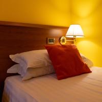 Posteľ alebo postele v izbe v ubytovaní Hotel New Genziana