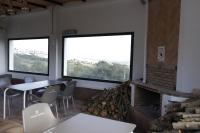 Posedenie v ubytovaní Hostal Restaurante Benalup Golf