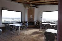 Reštaurácia alebo iné gastronomické zariadenie v ubytovaní Hostal Restaurante Benalup Golf