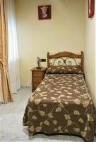 Posteľ alebo postele v izbe v ubytovaní Hotel Beatriz