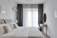 Posteľ alebo postele v izbe v ubytovaní Syntagma Spotlight Residence