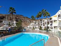 Bazén v ubytování Vista Bella - Planta baja al lado de la piscina - Ground floor by the pool nebo v jeho okolí