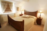 Postel nebo postele na pokoji v ubytování Heatons Guesthouse