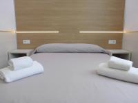 Posteľ alebo postele v izbe v ubytovaní Rentalmar Navarra family suites