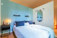 A bed or beds in a room at Top Living Apartments - Torino Centro