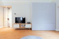 A television and/or entertainment centre at Top Living Apartments - Torino Centro