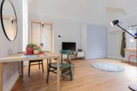 A television and/or entertainment centre at Top Living Apartments - Torino Centro