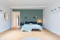 A bed or beds in a room at Top Living Apartments - Torino Centro