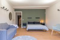 A bed or beds in a room at Top Living Apartments - Torino Centro