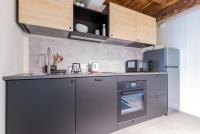 A kitchen or kitchenette at Top Living Apartments - Torino Centro
