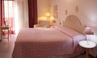 Posteľ alebo postele v izbe v ubytovaní Casa Margherita Affittacamere B&B