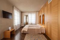 Posteľ alebo postele v izbe v ubytovaní Hotel Suite Inn