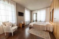 Posteľ alebo postele v izbe v ubytovaní Hotel Suite Inn