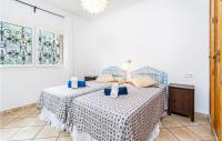 Posteľ alebo postele v izbe v ubytovaní 3 Bedroom Awesome Home In Porto Petro