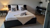 Cama ou camas em um quarto em COLMAR Centre VILLE 6 couchages 3 grandes chambres
