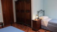 A bed or beds in a room at B&B Mela