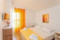 Posteľ alebo postele v izbe v ubytovaní Apartman Prlić 3
