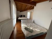Posteľ alebo postele v izbe v ubytovaní B&B DA NONNA ANACLE