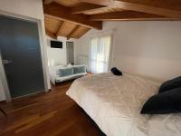 Posteľ alebo postele v izbe v ubytovaní B&B DA NONNA ANACLE