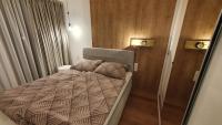 Posteľ alebo postele v izbe v ubytovaní Napfény Resort Exclusive