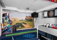 uma sala com um alvo de dardos e um pôster na parede em Hotel Concordia em Lund