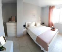 Postel nebo postele na pokoji v ubytování Cozy apartament in the heart of Santa Cruz