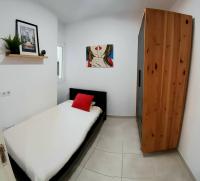 Postel nebo postele na pokoji v ubytování Cozy apartament in the heart of Santa Cruz