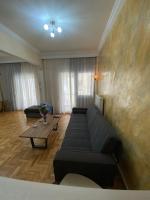 A seating area at Beautiful apartment in the center of Thessaloniki