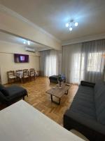 A seating area at Beautiful apartment in the center of Thessaloniki