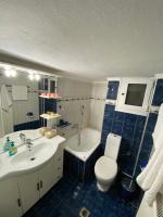 A bathroom at Beautiful apartment in the center of Thessaloniki