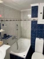 A bathroom at Beautiful apartment in the center of Thessaloniki