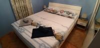 En eller flere senge i et v&aelig;relse p&aring; Apartman Josipovic
