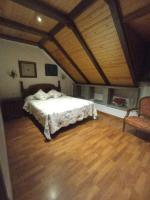 A bed or beds in a room at Apartamentos Sorripas 2 hab