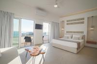 Posteľ alebo postele v izbe v ubytovaní Sfakia Seaside luxury Suites