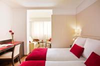 Postel nebo postele na pokoji v ubytování Grupotel Gravina