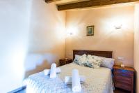 Postel nebo postele na pokoji v ubytování Villa Capo