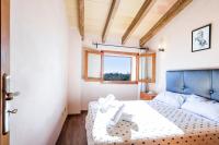Postel nebo postele na pokoji v ubytování Villa Capo