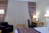 Postel nebo postele na pokoji v ubytování Tugcu Hotel Select