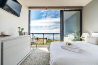 Postel nebo postele na pokoji v ubytování Hillside Villa