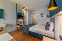 Tema 242 Hotelにあるベッド