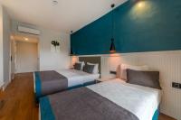 Tema 242 Hotelにあるベッド
