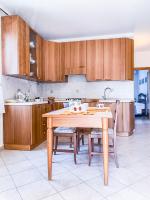 Kuchyňa alebo kuchynka v ubytovaní Appartamento La Casa Rossa - Affitti Brevi Italia